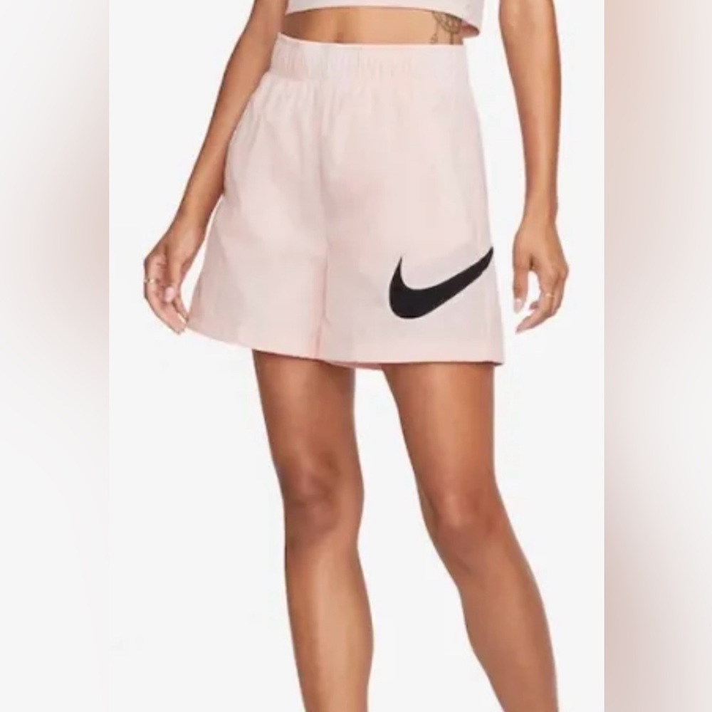 Nike Women's Pink Athletic Shorts with Black Swoosh